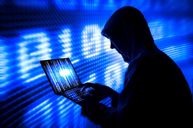 Blue silhouette hacker